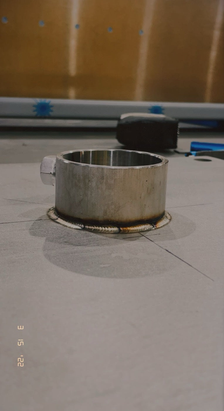 Sleeve welded to plate